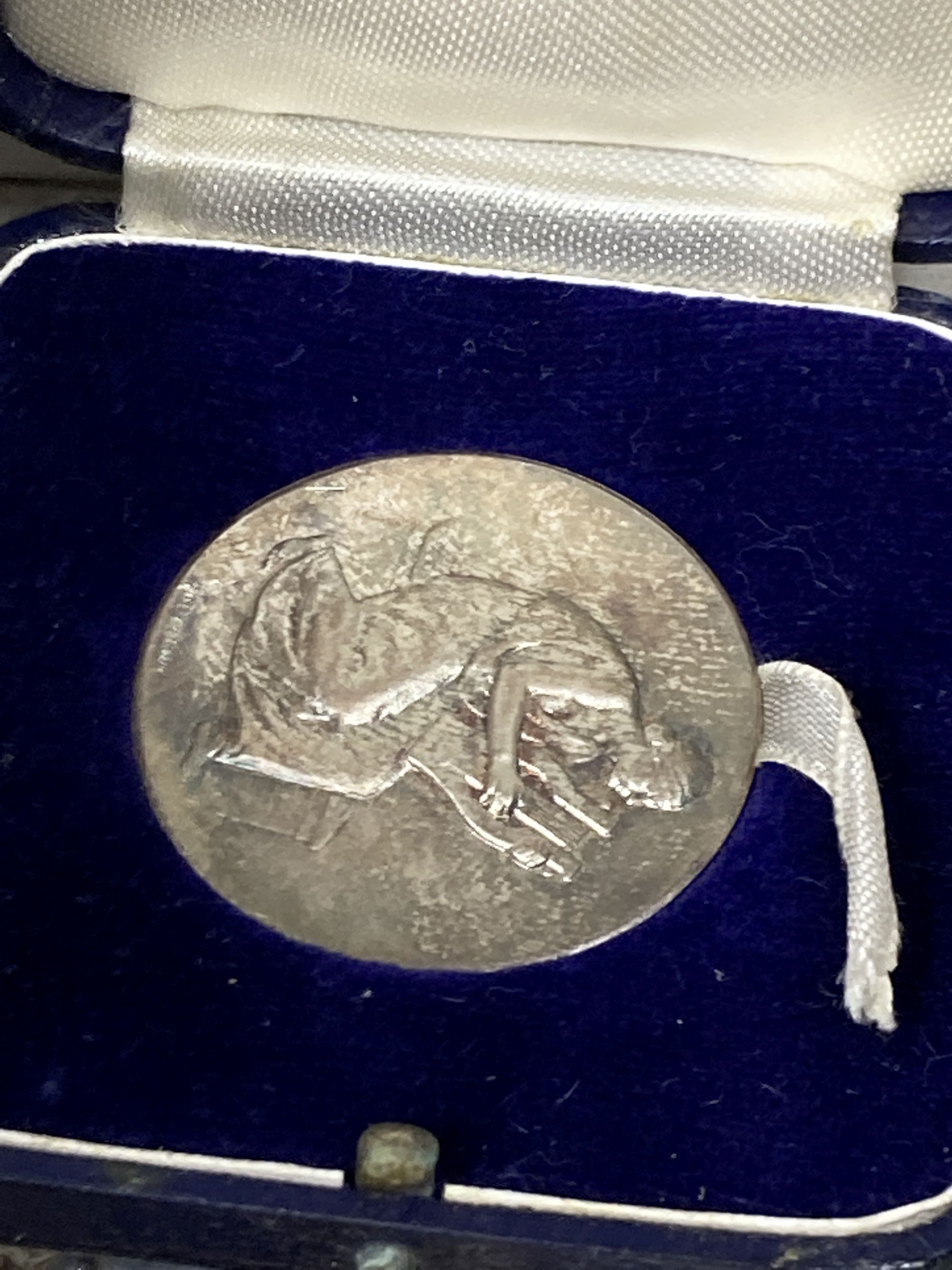 A quantity of silver, including wine labels and assorted costume jewellery.